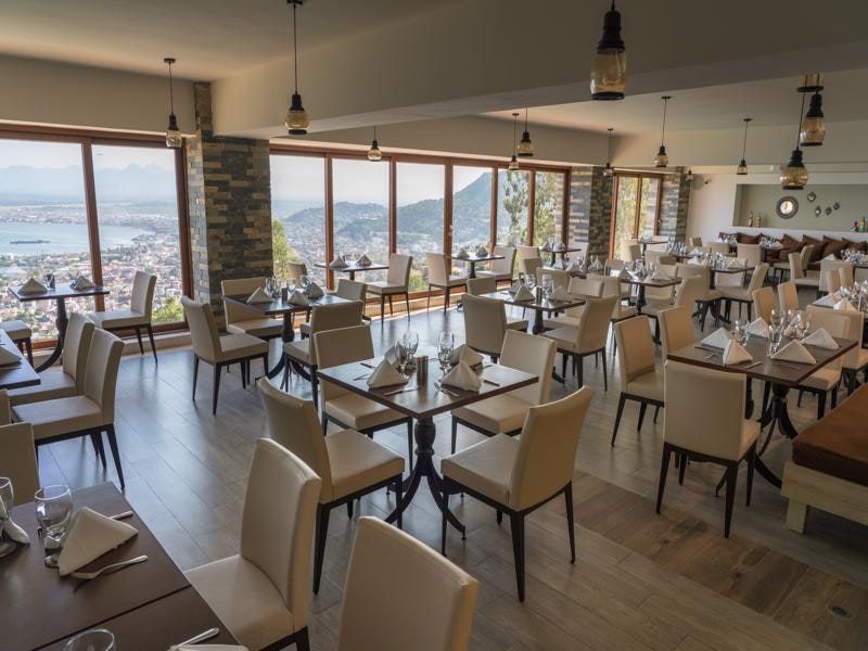 Restaurant dining room with city views
