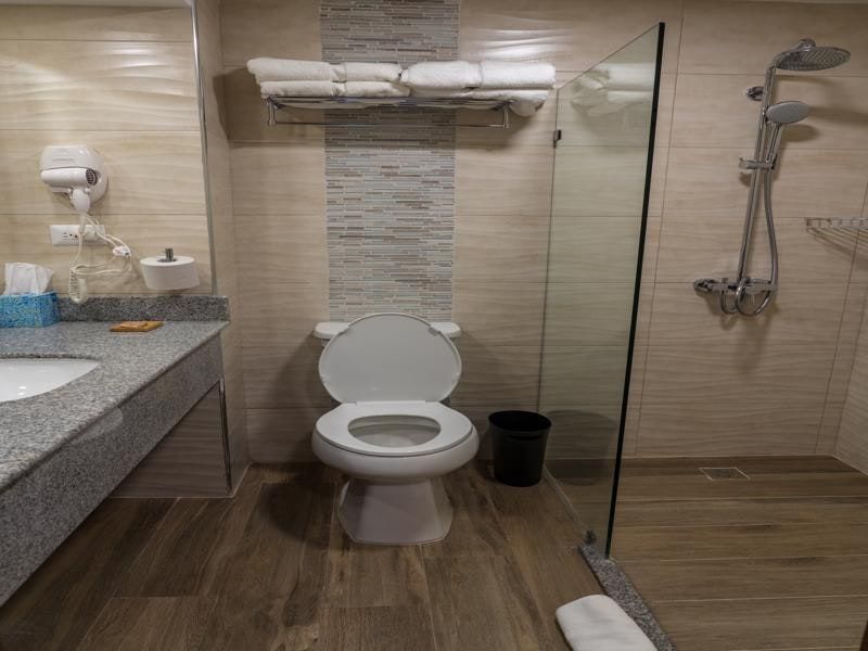 Bathroom with shower and vanity