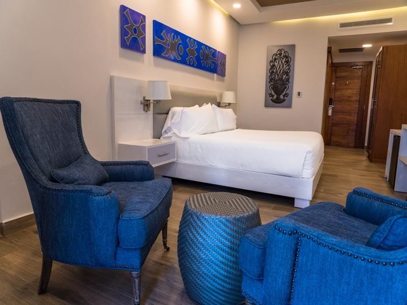 Seating area with a blue armchair