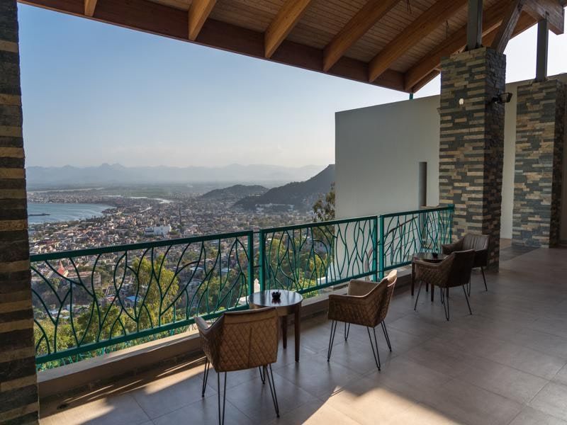 Terrace with chairs overlooking the bay